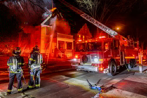 Student Trauma Response, firefighters managing fires in a residential neighborhood
