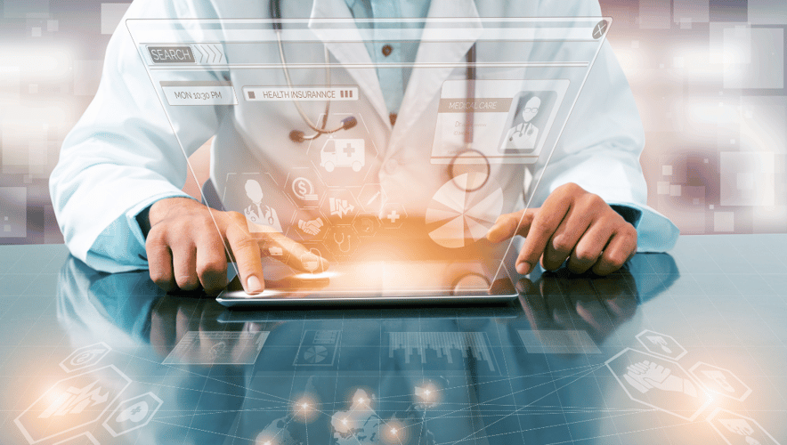 AI in healthcare, demonstrated by a physician examining technologies on a screen