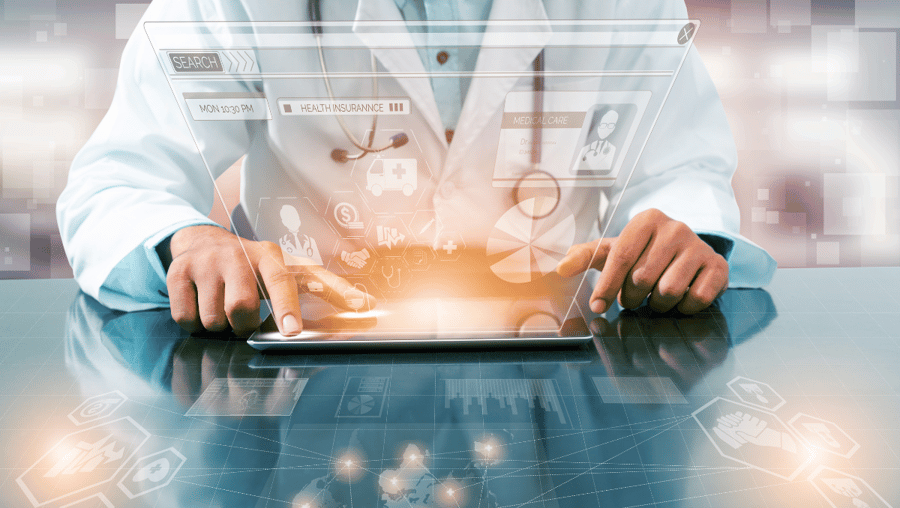 AI in healthcare, demonstrated by a physician examining technologies on a screen