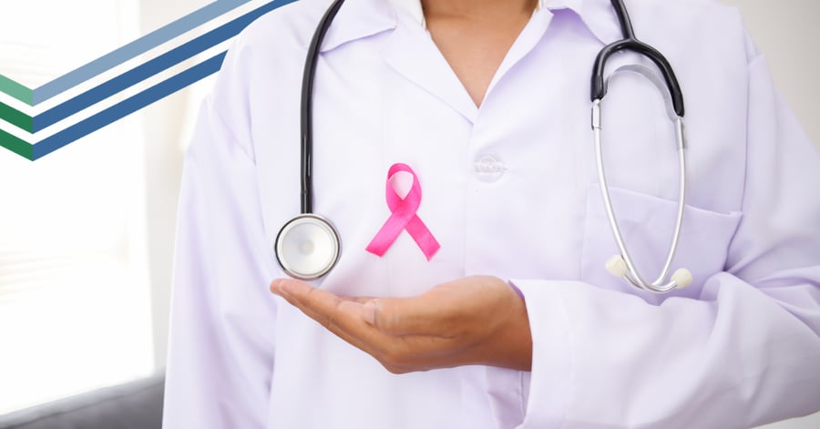 A healthcare professional in a white coat with a stethoscope around their neck, holding a pink breast cancer awareness ribbon.