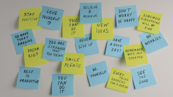 Post-it notes covered with affirmations: people can build self-compassion with affirmations like these.