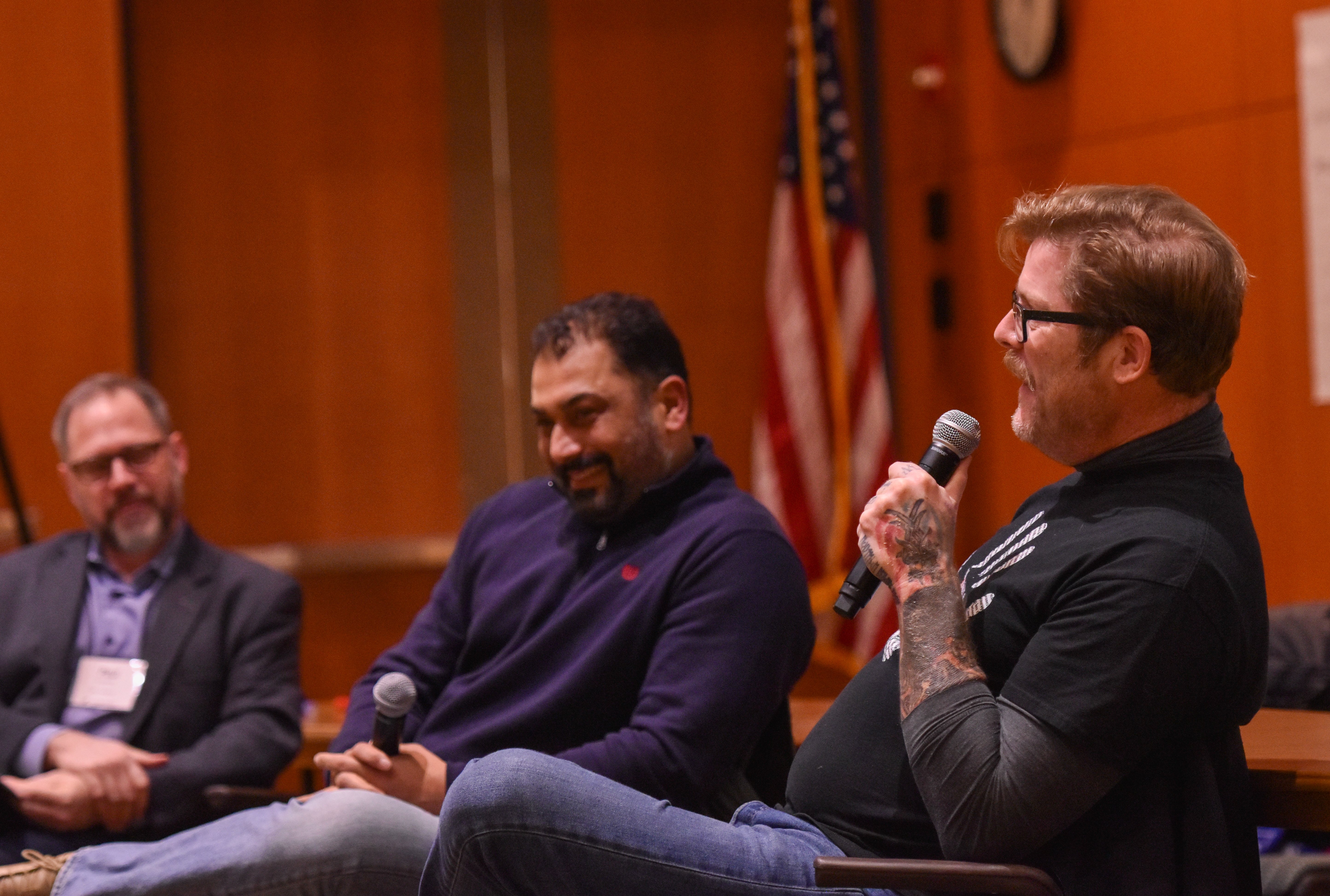 Pardeep Kaleka and Arlo Michaelis discuss racism and public health at the ABH learning community event.