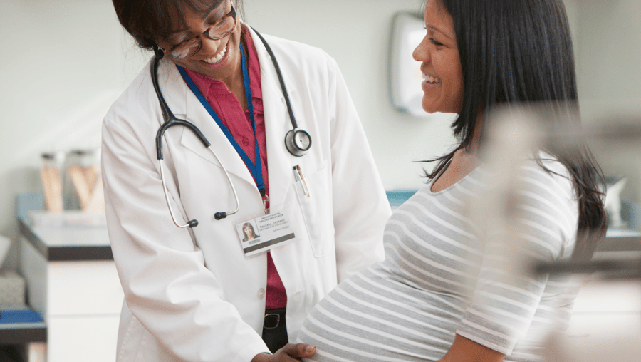 A picture of a mother and her doctor; AHW Health Research Grants Support Maternal Health Improvements in Wisconsin