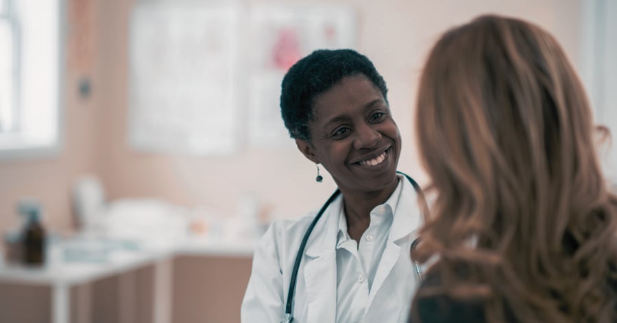 Woman consulting with her doctor